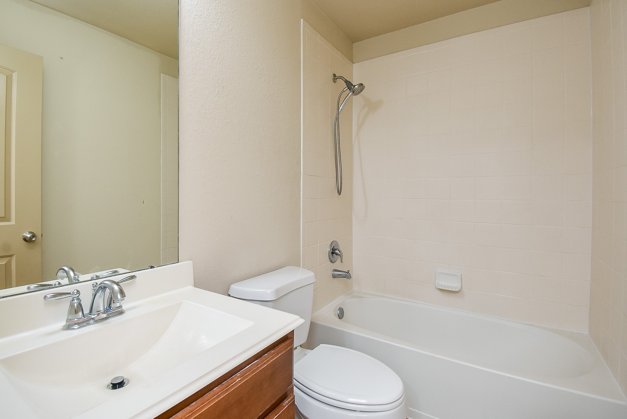 2106 Harmon Crest Court Spring, TX 77373 - Photo 22 of 32 a bathroom with a sink a toilet and a bathtub