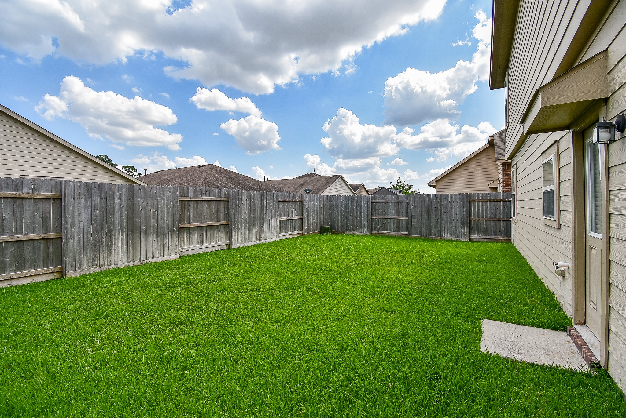 2106 Harmon Crest Court Spring, TX 77373 - Photo 32 of 32 a view of a backyard with garden