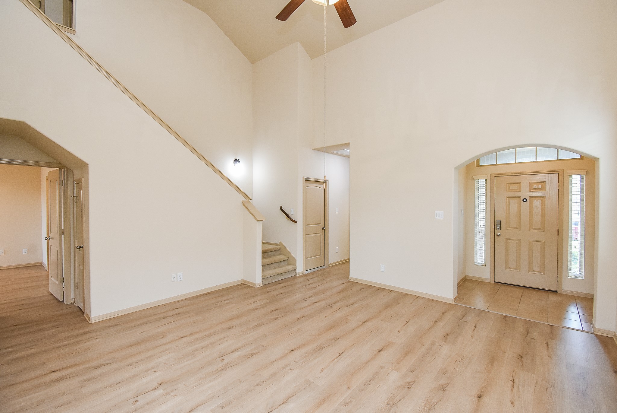 2106 Harmon Crest Court Spring, TX 77373 - Photo 6 of 32 an empty room with wooden floor and entryway