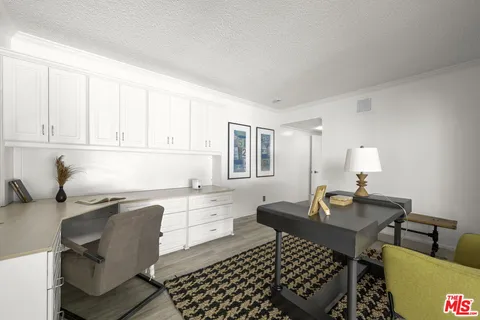 a kitchen with a sink and breakfast area