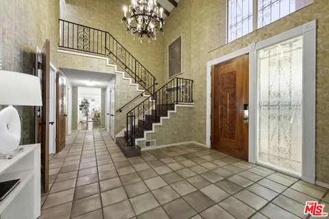 a view of a hallway with entryway