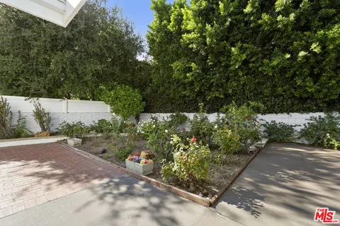 a view of a building with a swimming pool