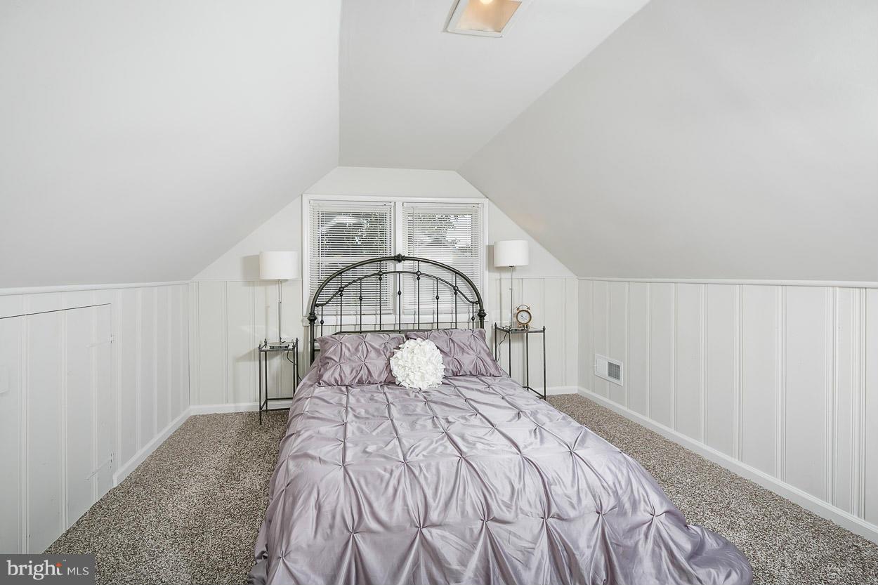 1816 Forrest Road Baltimore, MD 21234 - Photo 11 of 19 a bedroom with a bed and a large window