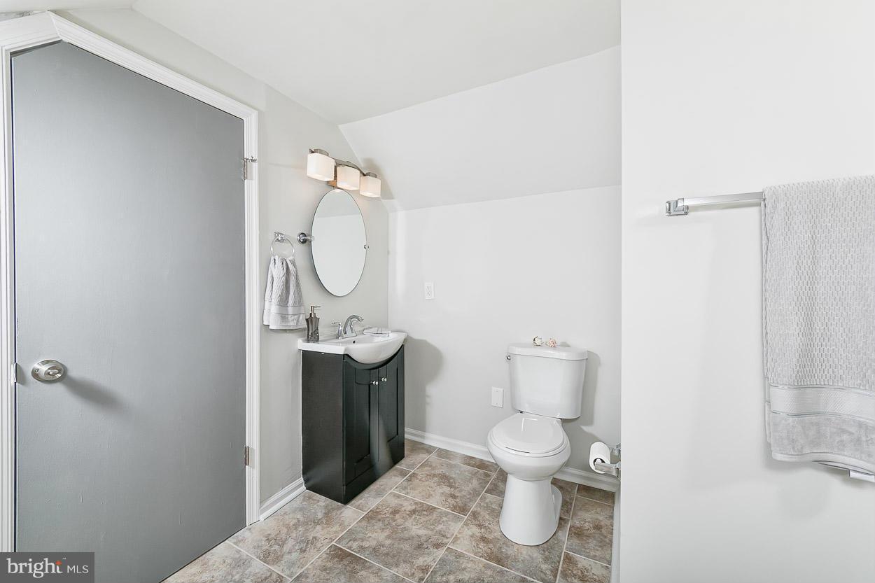 1816 Forrest Road Baltimore, MD 21234 - Photo 13 of 19 a bathroom with a toilet and a shower