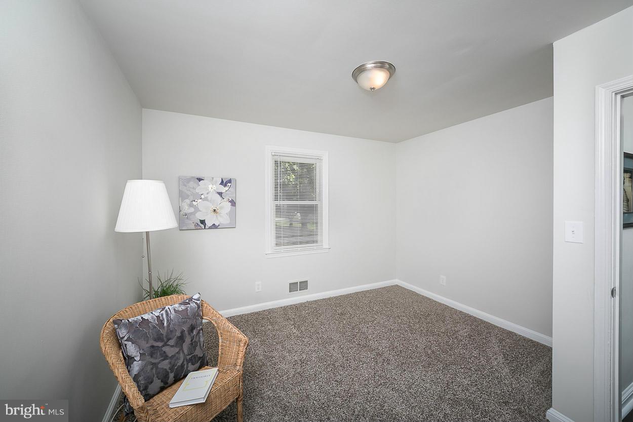 1816 Forrest Road Baltimore, MD 21234 - Photo 14 of 19 a living room with furniture and a window