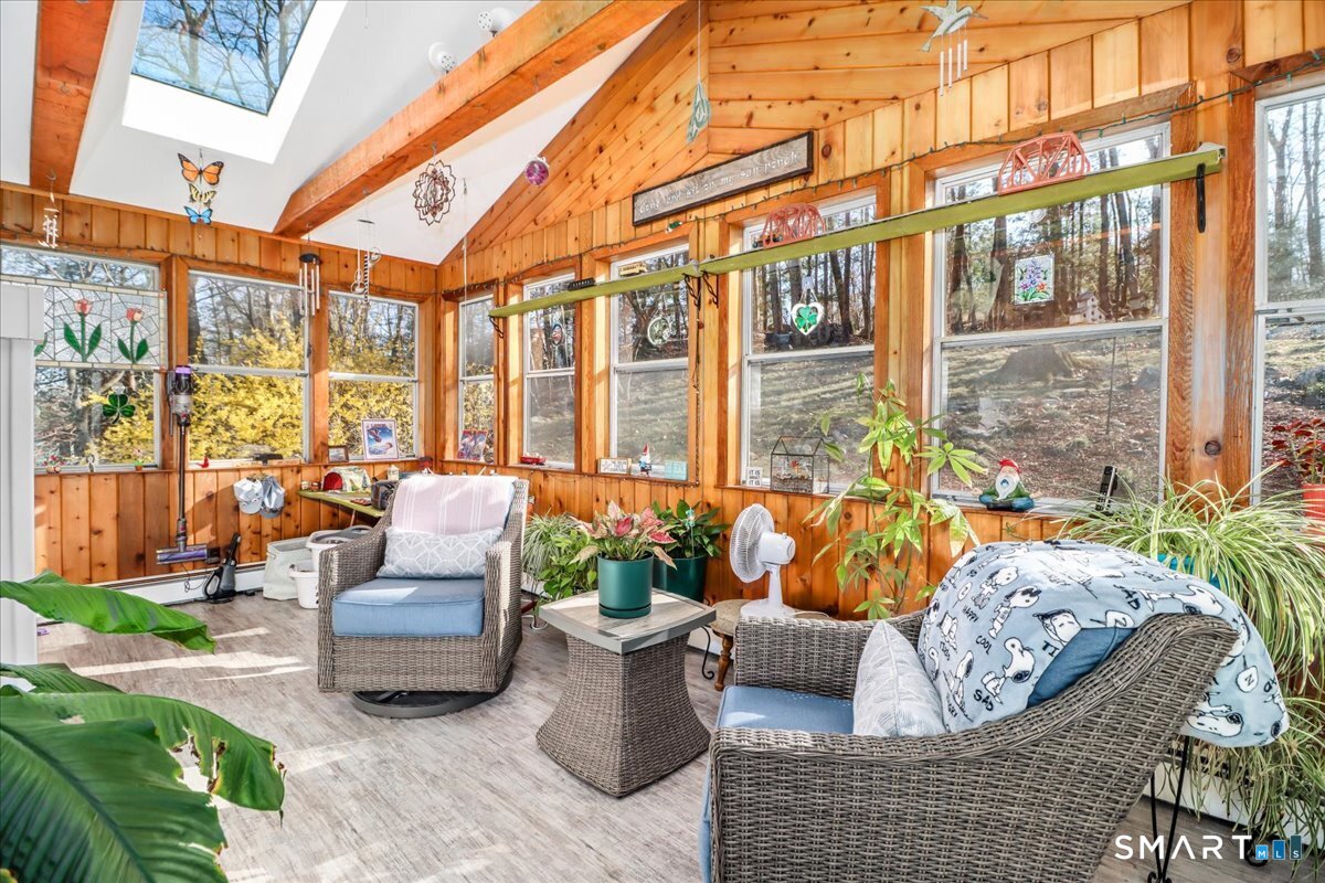 156 Stadley Rough Road Danbury, CT 06811 - Photo 15 of 32 Versatility!! This bright and airy sun room/mud room is a great place to spend time enjoying the views in the backyard