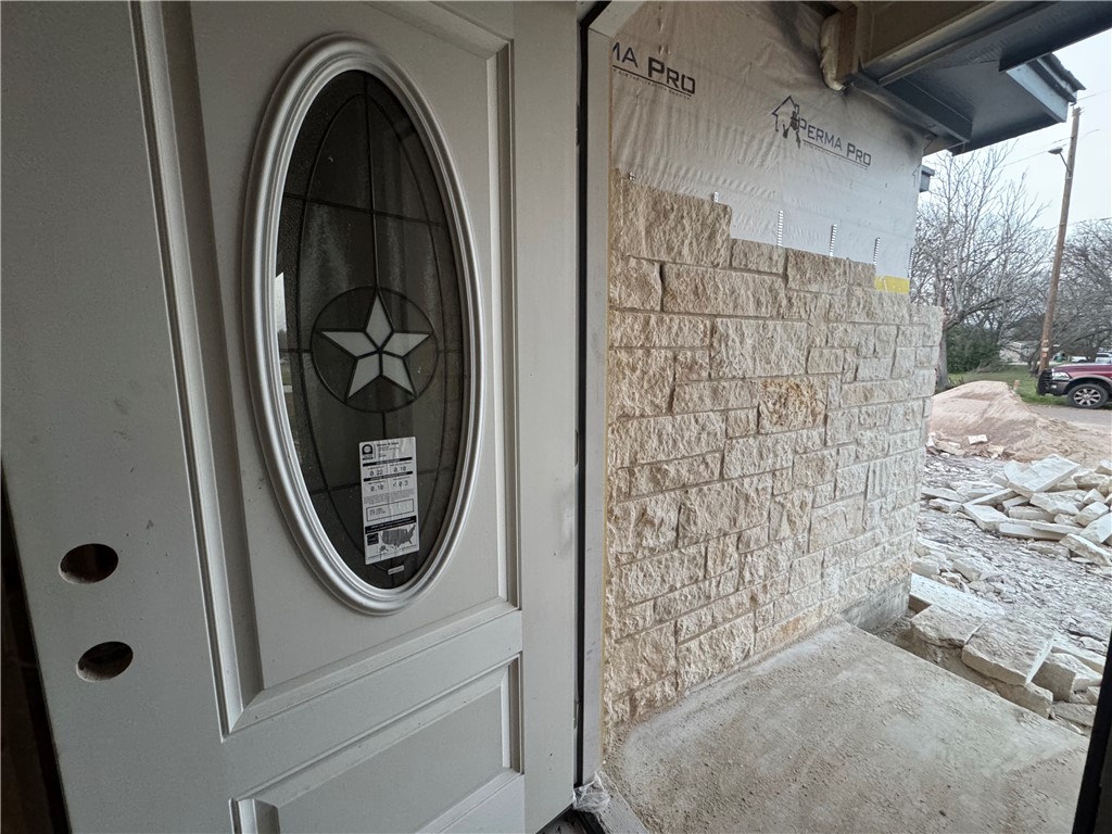 331 Rogers Street Rogers, TX 76569 - Photo 2 of 11 a close view of a bathroom with a sink and a mirror