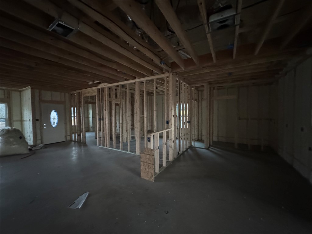 331 Rogers Street Rogers, TX 76569 - Photo 7 of 11 a view of empty room with wooden floor and fan