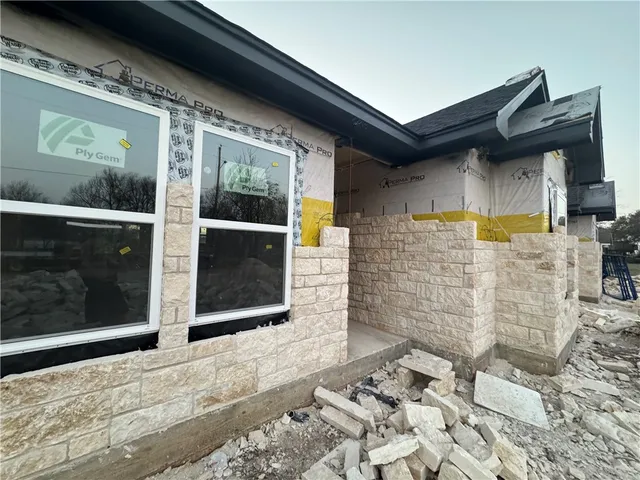 a front view of a house with yard