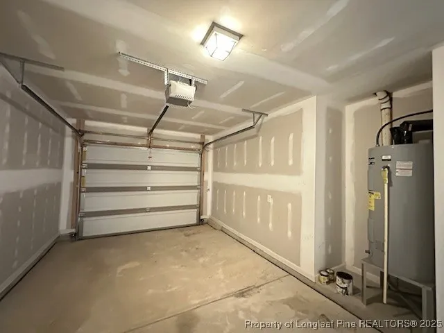 a view of an empty room with a staircase