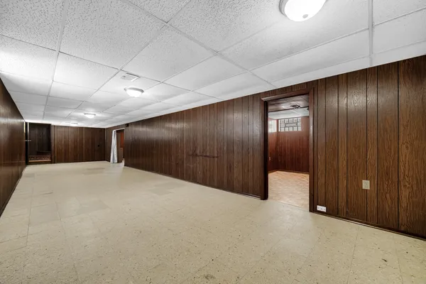 an empty room with closet area