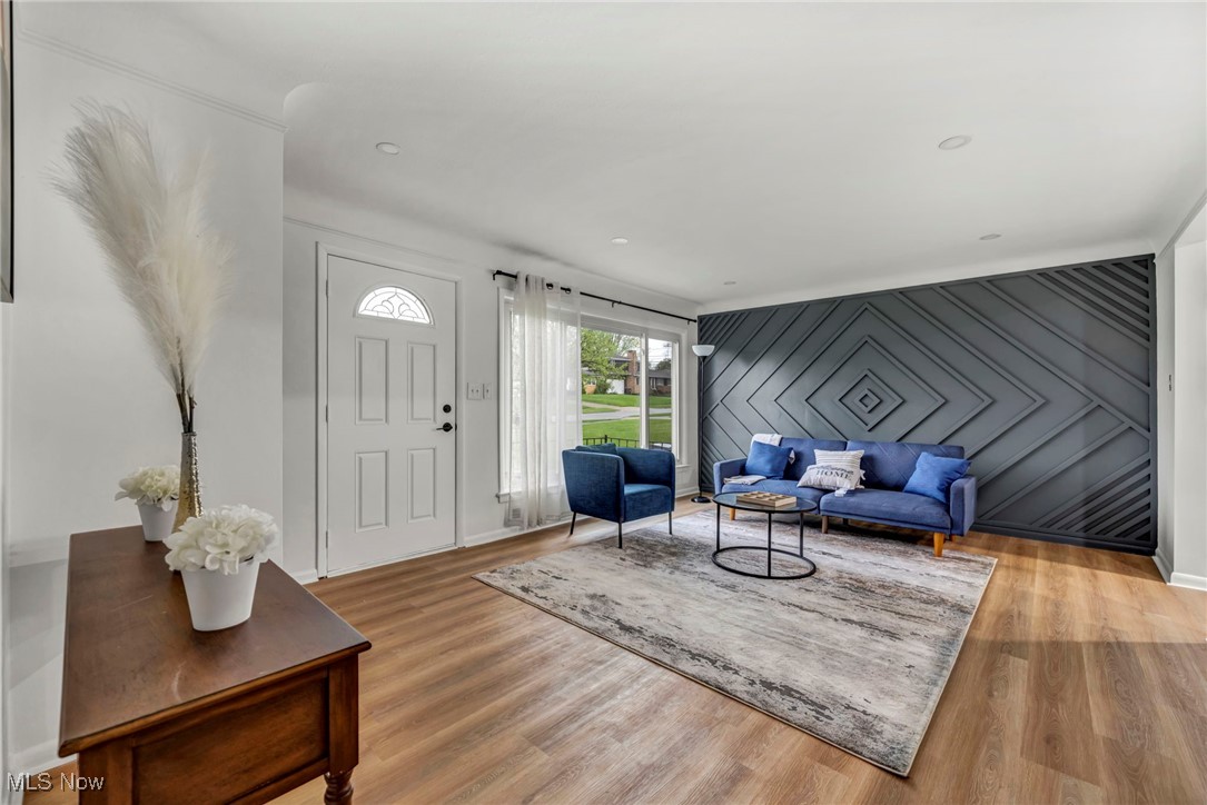 2666 Dentzler Road Parma, OH 44134 - Photo 8 of 41 Living room with baseboards and wood finished floors