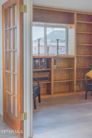 a bathroom with a sink vanity mirror and toilet