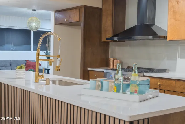 a view of a city street with tall buildings