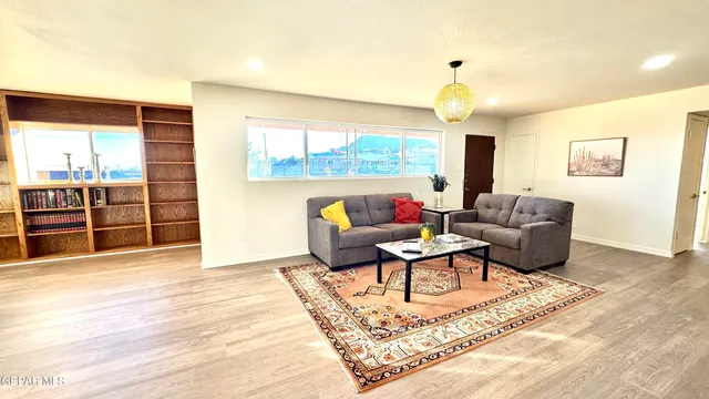 a kitchen with a stove a sink and a refrigerator