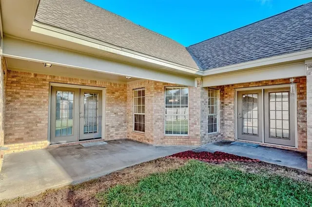 a view of a house with a garden