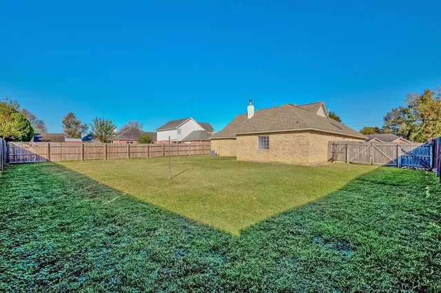 a house view with a garden space