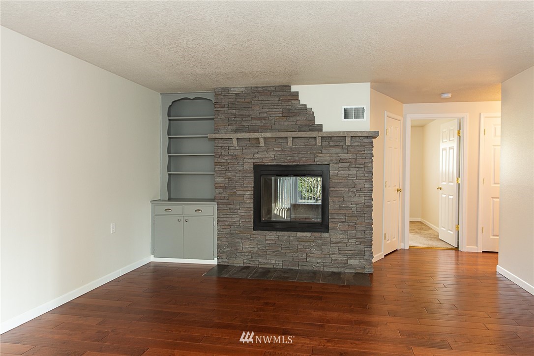 23605 5th Avenue West Bothell, WA 98021 - Photo 12 of 20 a view of an empty room and wooden floor