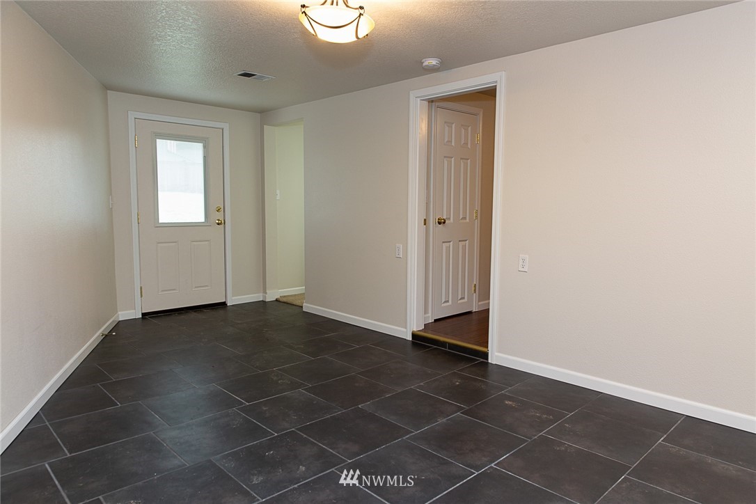 23605 5th Avenue West Bothell, WA 98021 - Photo 18 of 20 a view of an empty room with a window