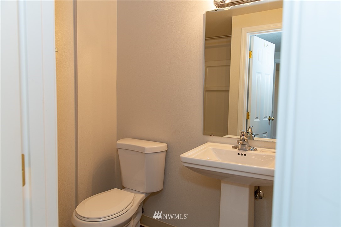 23605 5th Avenue West Bothell, WA 98021 - Photo 19 of 20 a bathroom with a sink a toilet and mirror