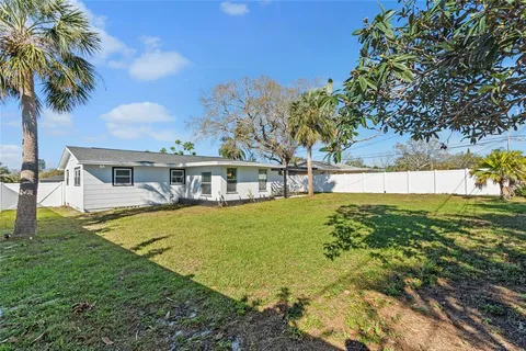 a view of a house with a big yard