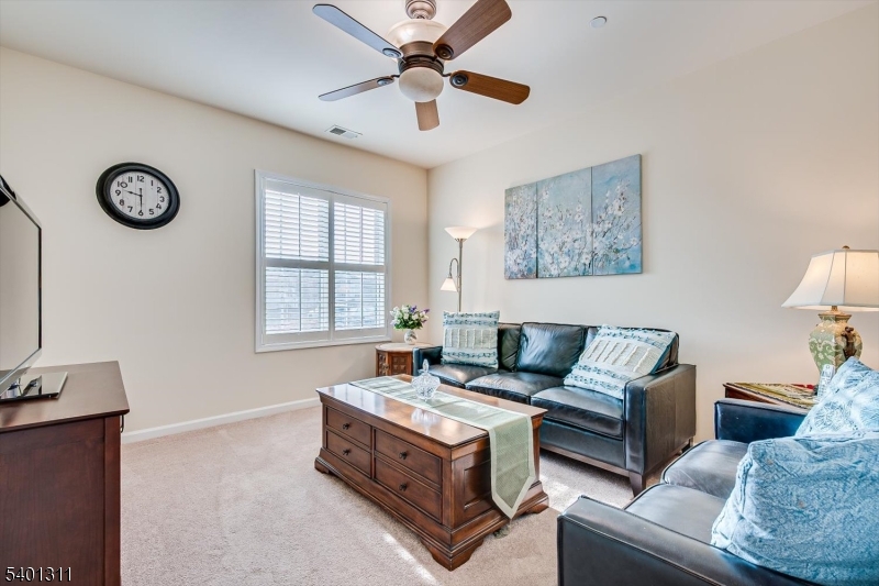 3108 Chesterwood Way Somerset, NJ 08873 - Photo 18 of 41 a living room with furniture and a window