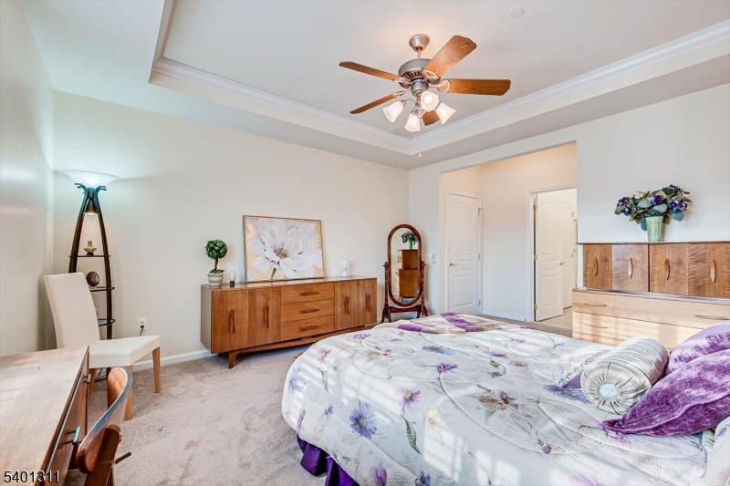 3108 Chesterwood Way Somerset, NJ 08873 - Photo 22 of 41 a bedroom with a bed dresser and wooden floor
