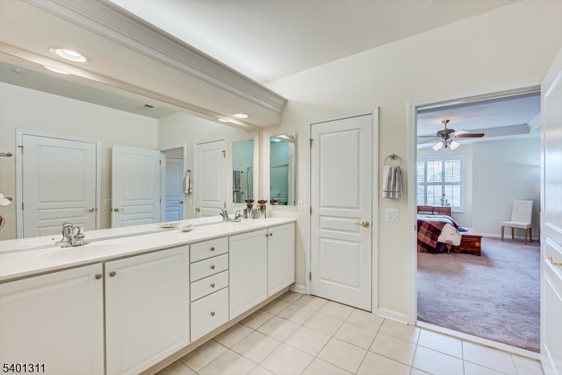 3108 Chesterwood Way Somerset, NJ 08873 - Photo 24 of 41 a spacious bathroom with a double vanity sink mirror and shower