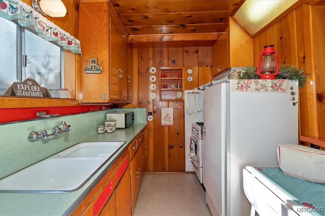 620 Cedar Lane Twin Peaks, CA 92391 - Photo 14 of 31 a bathroom with a sink and a mirror