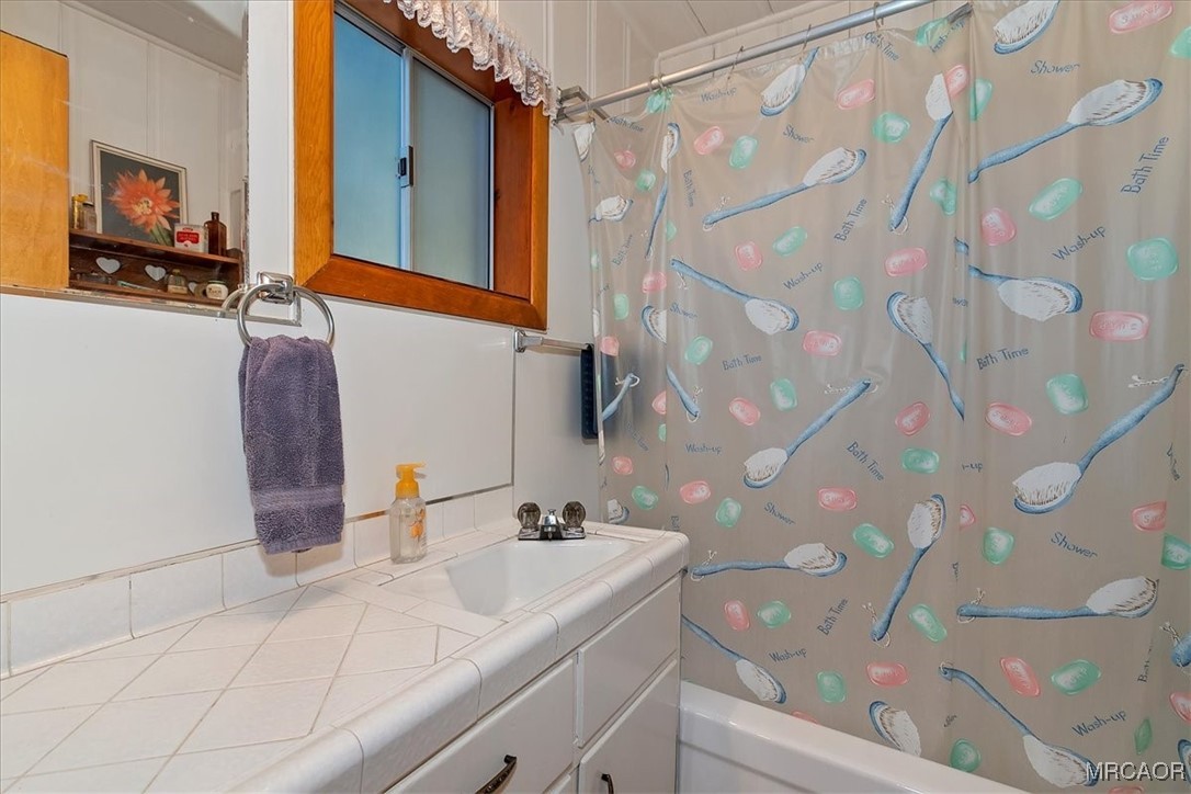 620 Cedar Lane Twin Peaks, CA 92391 - Photo 18 of 31 a bathroom with a sink and a mirror