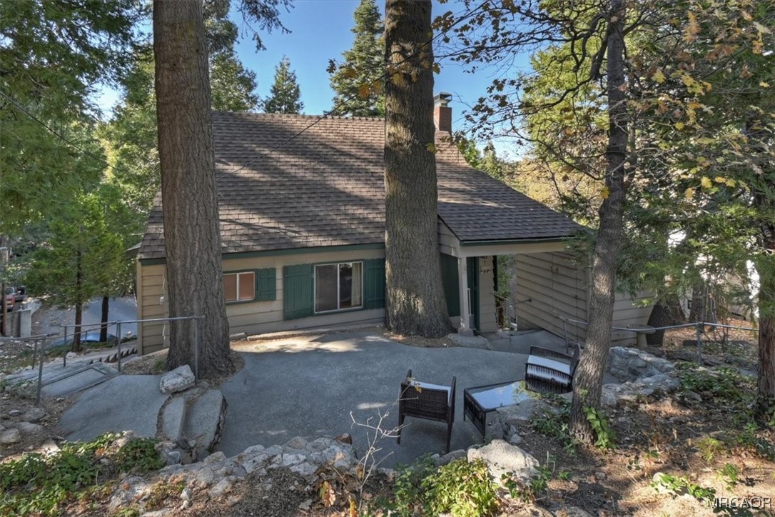 620 Cedar Lane Twin Peaks, CA 92391 - Photo 2 of 31 a view of a house with backyard and sitting area