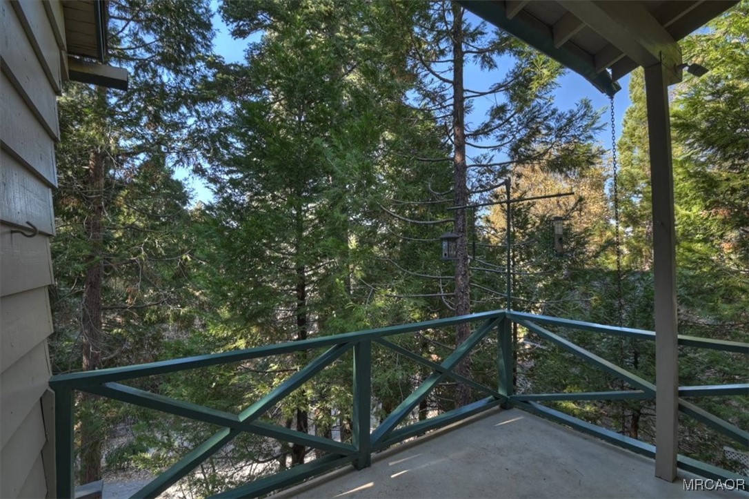 620 Cedar Lane Twin Peaks, CA 92391 - Photo 22 of 31 a view of a balcony with trees