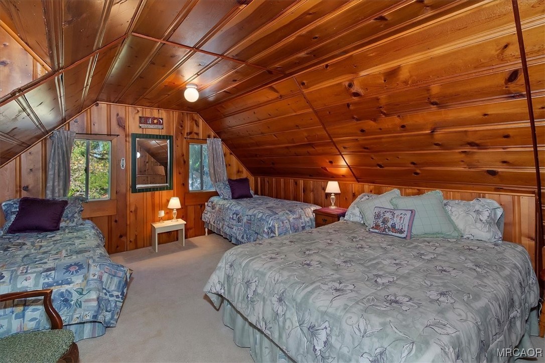 620 Cedar Lane Twin Peaks, CA 92391 - Photo 6 of 31 a bedroom with bed and wooden floor