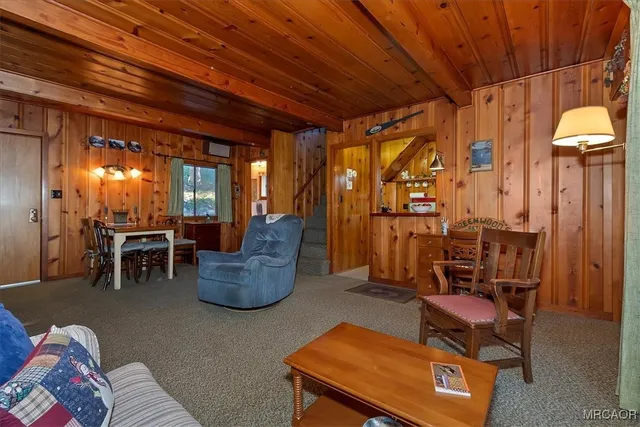 a room with furniture and gym equipment