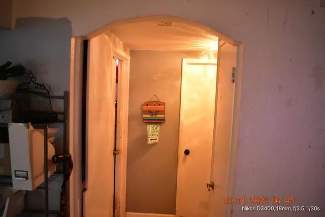 a view of a bathroom with a glass door