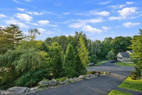 a view of a street with of trees