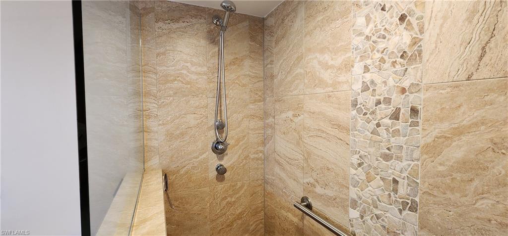 102 Georgetown Boulevard, Unit 102 Naples, FL 34112 - Photo 17 of 29 a bathroom with a shower