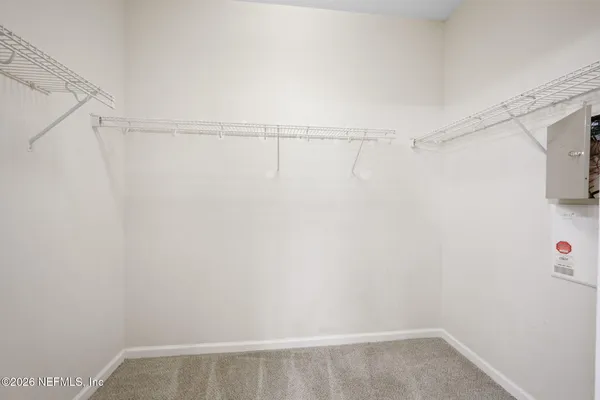 a view of small space with racks on the wall
