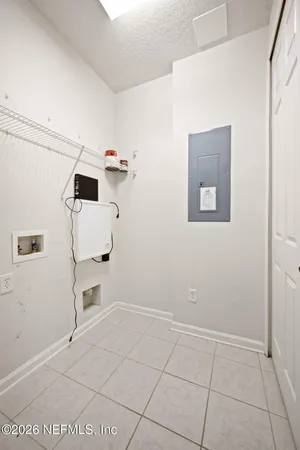 a view of kitchen and utility room