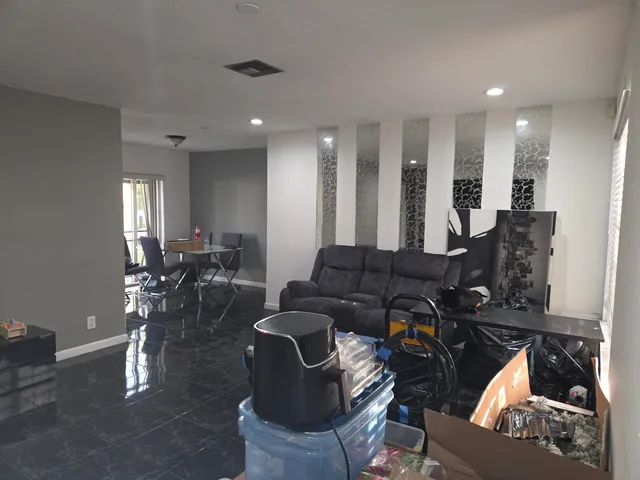 a living room with furniture and a view of living room