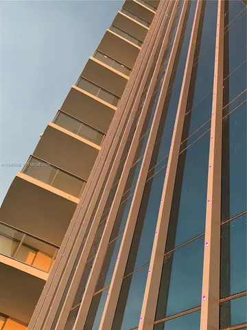 a view of outdoor space with palm trees