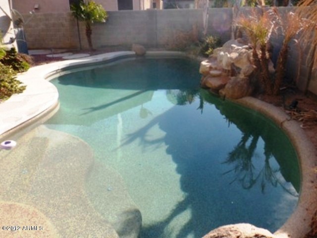 3469 East Cabazon Court Gilbert, AZ 85297 - Photo 23 of 25 a vase of flowers sitting on a table