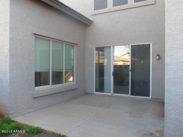 3469 East Cabazon Court Gilbert, AZ 85297 - Photo 24 of 25 a view of an empty room with a window