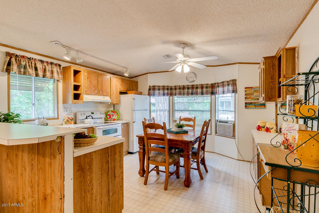 2887 Long Rifle Place Overgaard, AZ 85933 - Photo 11 of 36 11 - EAT IN KITCHEN