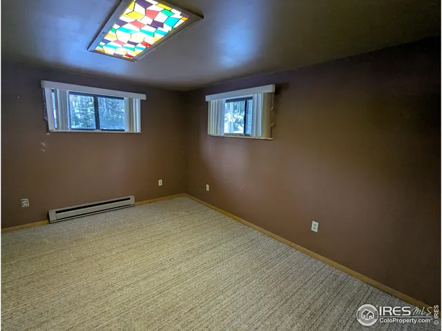 a view of a forest from a building