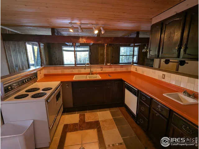 a view of a porch with a floor to ceiling window and a fireplace