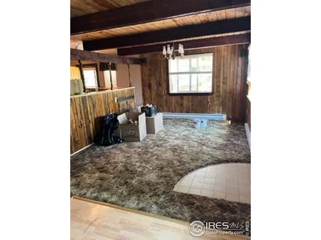 a bathroom with a granite countertop sink toilet a mirror a bathtub and shower