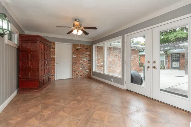 a view of an empty room with a balcony