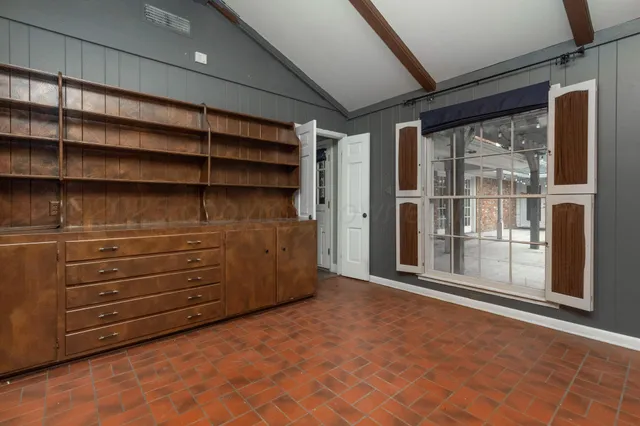 a room with furniture and window