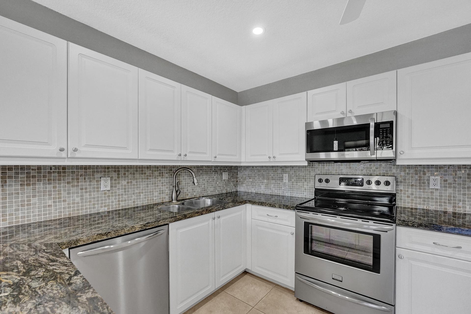 6761 Montego Bay Boulevard, Unit D Boca Raton, FL 33433 - Photo 12 of 38 Kitchen